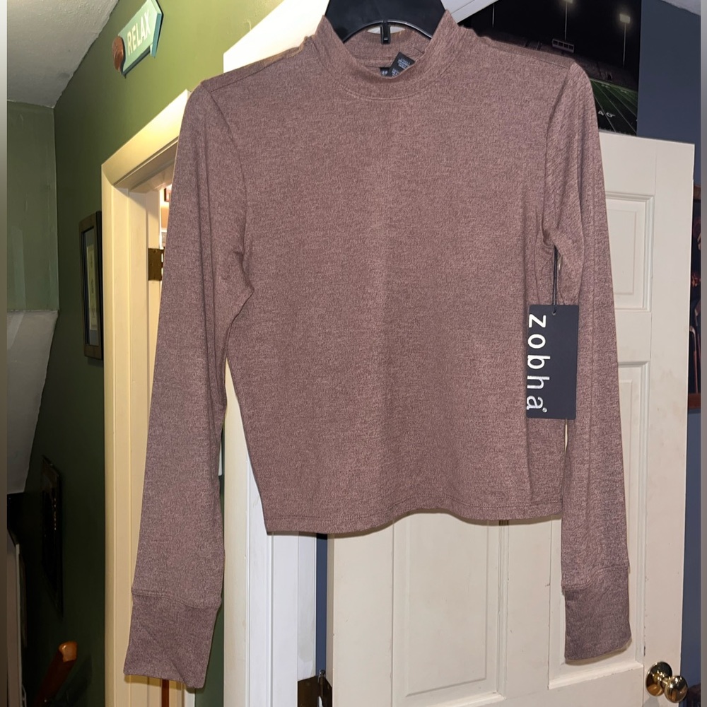 Brand new Zobha top 90%polyester 10% spandex makes this shirt beyond comfortable
